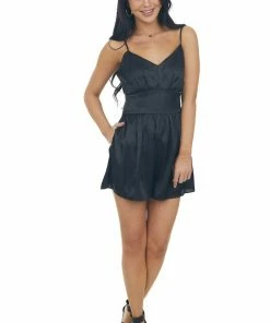 NAKED ZEBRA Dresses Black Cheetah Print Smocked Back Silky Romper