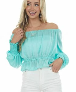 She + Sky Tops Aquamarine Silky Smocked Cuff Peplum Blouse