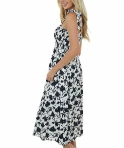 Miss Sparkling Black And Off White Printed Smocked Midi Dress Dresses