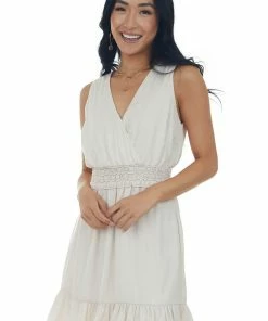 She + Sky Champagne Sleeveless Surplice Smocked Mini Dress