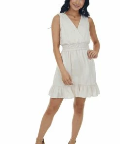 She + Sky Champagne Sleeveless Surplice Smocked Mini Dress