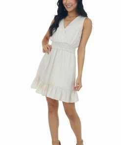She + Sky Champagne Sleeveless Surplice Smocked Mini Dress