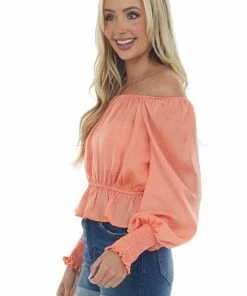She + Sky Tops Coral Silky Smocked Cuff Peplum Blouse