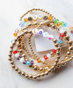 Fame Accessories Gold And Multi Beaded Mama 5 Piece Bracelet Set