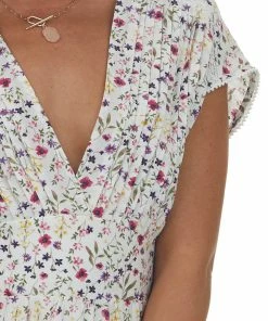 Sweet Lemon Ivory Ditsy Floral Tiered Surplice Mini Dress Dresses 17 Sweet Lemon Ivory Ditsy Floral Tiered Surplice Mini Dress Dresses