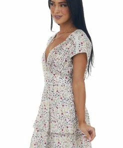 Sweet Lemon Ivory Ditsy Floral Tiered Surplice Mini Dress Dresses 15 Sweet Lemon Ivory Ditsy Floral Tiered Surplice Mini Dress Dresses