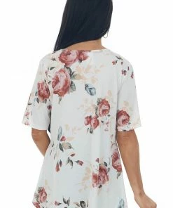 HEIMISH Tops Ivory Floral V Neck Criss Cross Babydoll Top 12 HEIMISH Tops Ivory Floral V Neck Criss Cross Babydoll Top
