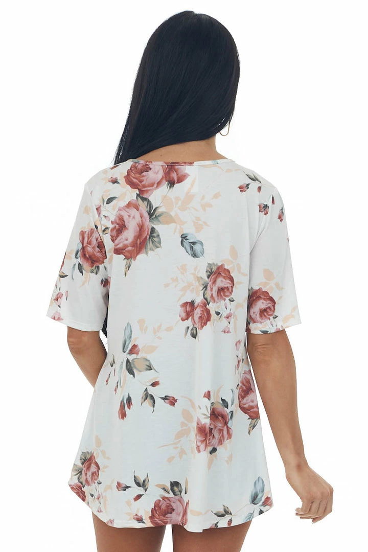 HEIMISH Tops Ivory Floral V Neck Criss Cross Babydoll Top 7 HEIMISH Tops Ivory Floral V Neck Criss Cross Babydoll Top