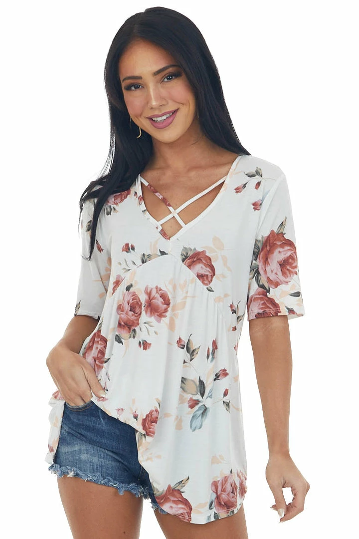 HEIMISH Tops Ivory Floral V Neck Criss Cross Babydoll Top 3 HEIMISH Tops Ivory Floral V Neck Criss Cross Babydoll Top