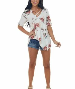 HEIMISH Tops Ivory Floral V Neck Criss Cross Babydoll Top 9 HEIMISH Tops Ivory Floral V Neck Criss Cross Babydoll Top