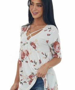 HEIMISH Tops Ivory Floral V Neck Criss Cross Babydoll Top 11 HEIMISH Tops Ivory Floral V Neck Criss Cross Babydoll Top