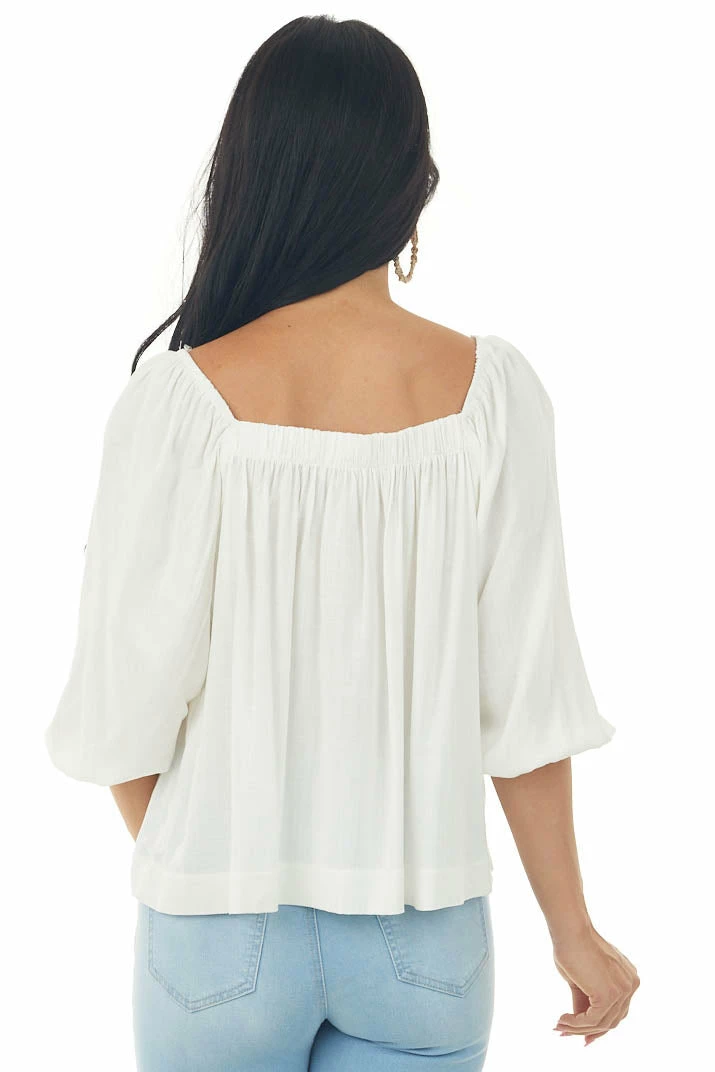 Charlotte Avery Ivory Half Length Bubble Sleeve Blouse With High Low Hemline 7 Charlotte Avery Ivory Half Length Bubble Sleeve Blouse With High Low Hemline