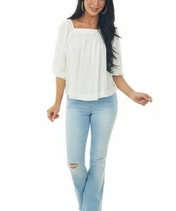 Charlotte Avery Ivory Half Length Bubble Sleeve Blouse With High Low Hemline 10 Charlotte Avery Ivory Half Length Bubble Sleeve Blouse With High Low Hemline