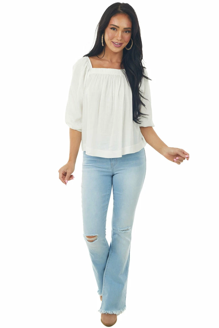 Charlotte Avery Ivory Half Length Bubble Sleeve Blouse With High Low Hemline 5 Charlotte Avery Ivory Half Length Bubble Sleeve Blouse With High Low Hemline