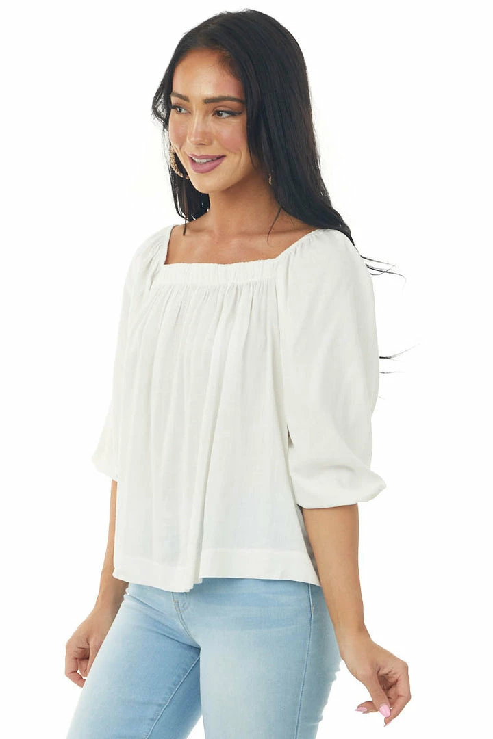 Charlotte Avery Ivory Half Length Bubble Sleeve Blouse With High Low Hemline 6 Charlotte Avery Ivory Half Length Bubble Sleeve Blouse With High Low Hemline