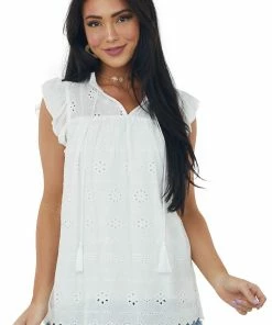 Hailey & Co Tops Ivory Short Sleeve Eyelet Tassel Detail Top