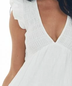 HYFVE Ivory Smocked V Neck Babydoll Tiered Mini Dress Dresses 17 HYFVE Ivory Smocked V Neck Babydoll Tiered Mini Dress Dresses