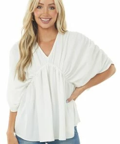 143 Story Tops Ivory V Neck Half Sleeve Babydoll Flowy Blouse