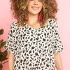 HESED Tops Ivory And Black Animal Print Short Sleeve Blouse 1 HESED Tops Ivory And Black Animal Print Short Sleeve Blouse