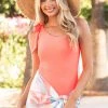 MARINA WEST SWIM Accessories Neon Coral One Shoulder One Piece Swimsuit With Tie Detail 1 MARINA WEST SWIM Accessories Neon Coral One Shoulder One Piece Swimsuit With Tie Detail