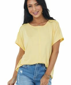 IWT Brands Tops Rich Buttercream Short Sleeve High Low Knit Top