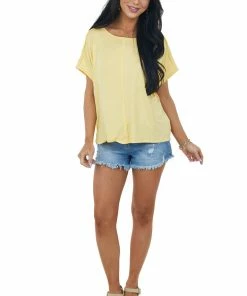 IWT Brands Tops Rich Buttercream Short Sleeve High Low Knit Top