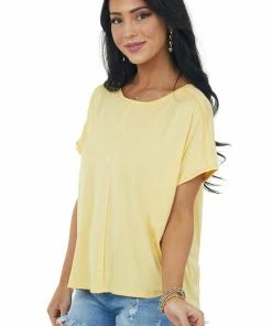 IWT Brands Tops Rich Buttercream Short Sleeve High Low Knit Top