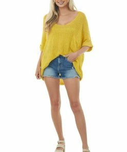 Ces Femme Tops Straw Rolled Cuff Loose Knit Top With Pocket