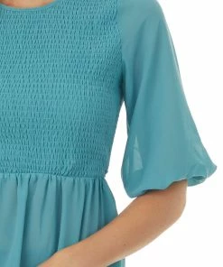 HYFVE Tops Vintage Teal Smocked Peplum Puff Sleeve Blouse 13 HYFVE Tops Vintage Teal Smocked Peplum Puff Sleeve Blouse