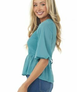 HYFVE Tops Vintage Teal Smocked Peplum Puff Sleeve Blouse 11 HYFVE Tops Vintage Teal Smocked Peplum Puff Sleeve Blouse