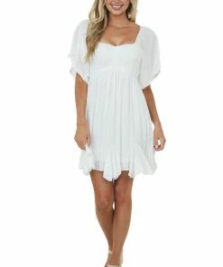 Umgee Dresses White Swiss Dot Flutter Sleeve Smocked Dress