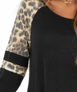 HEIMISH Black Stretchy Knit Top With Raglan Leopard Print Sleeves