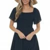 ANGIE Black Swiss Dot Smocked Mini Skater Dress