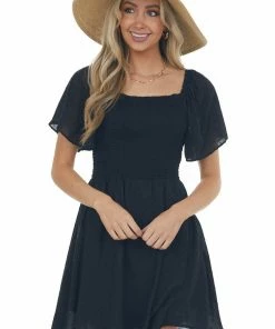 ANGIE Black Swiss Dot Smocked Mini Skater Dress