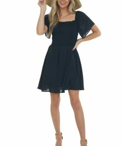 ANGIE Black Swiss Dot Smocked Mini Skater Dress