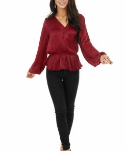 Caramela Burgundy Satin Surplice Blouse With Elastic Ruffle Hemline 19 Caramela Burgundy Satin Surplice Blouse With Elastic Ruffle Hemline