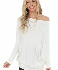 Cherish Cream Long Dolman Sleeve Knit Top With Asymmetrical Hemline