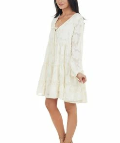 Peach Love Cream Textured Print Tiered Babydoll Dress With Long Sleeves Dresses