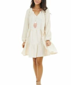 Umgee Cream Tiered Mini Dress With Crochet Sleeves And V Neckline