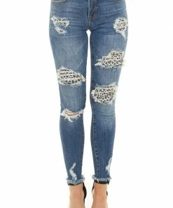 C'est Toi Bottoms Dark Wash Denim Skinny Jeans With Distressed Leopard Print
