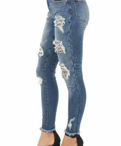 C'est Toi Bottoms Dark Wash Denim Skinny Jeans With Distressed Leopard Print