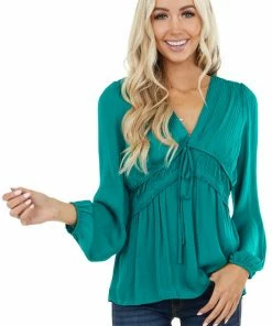 NAKED ZEBRA Emerald Cinch Waist Top With Front Tie And Ruffle Details
