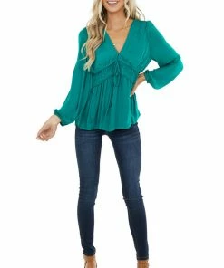 NAKED ZEBRA Emerald Cinch Waist Top With Front Tie And Ruffle Details