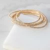 Fame Accessories Gold Rhinestone Elastic 5 Piece Bracelet Set 1 Fame Accessories Gold Rhinestone Elastic 5 Piece Bracelet Set