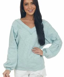 143 Story Heathered Seafoam Raw Edge V Neck Knit Top