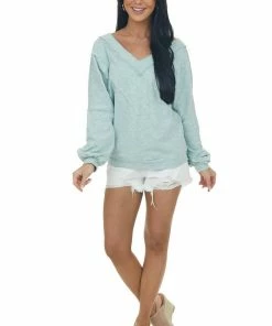 143 Story Heathered Seafoam Raw Edge V Neck Knit Top
