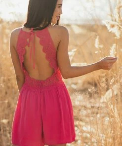 Style Melody Hot Pink Sleeveless Romper With Lace Peekaboo Waist Detail Dresses