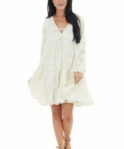 Peach Love Cream Textured Print Tiered Babydoll Dress With Long Sleeves Dresses
