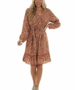 Davi & Dani Rust Floral Long Sleeve Surplice Neck Dress Dresses
