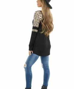 HEIMISH Black Stretchy Knit Top With Raglan Leopard Print Sleeves